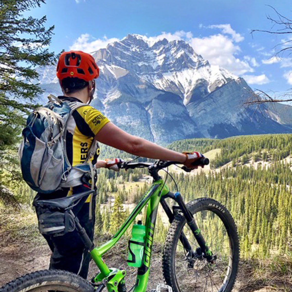 Mountain-Bike-Tours Cyclist Staring at Mountain